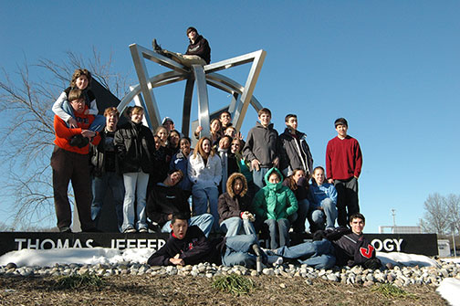 picture of students on statue